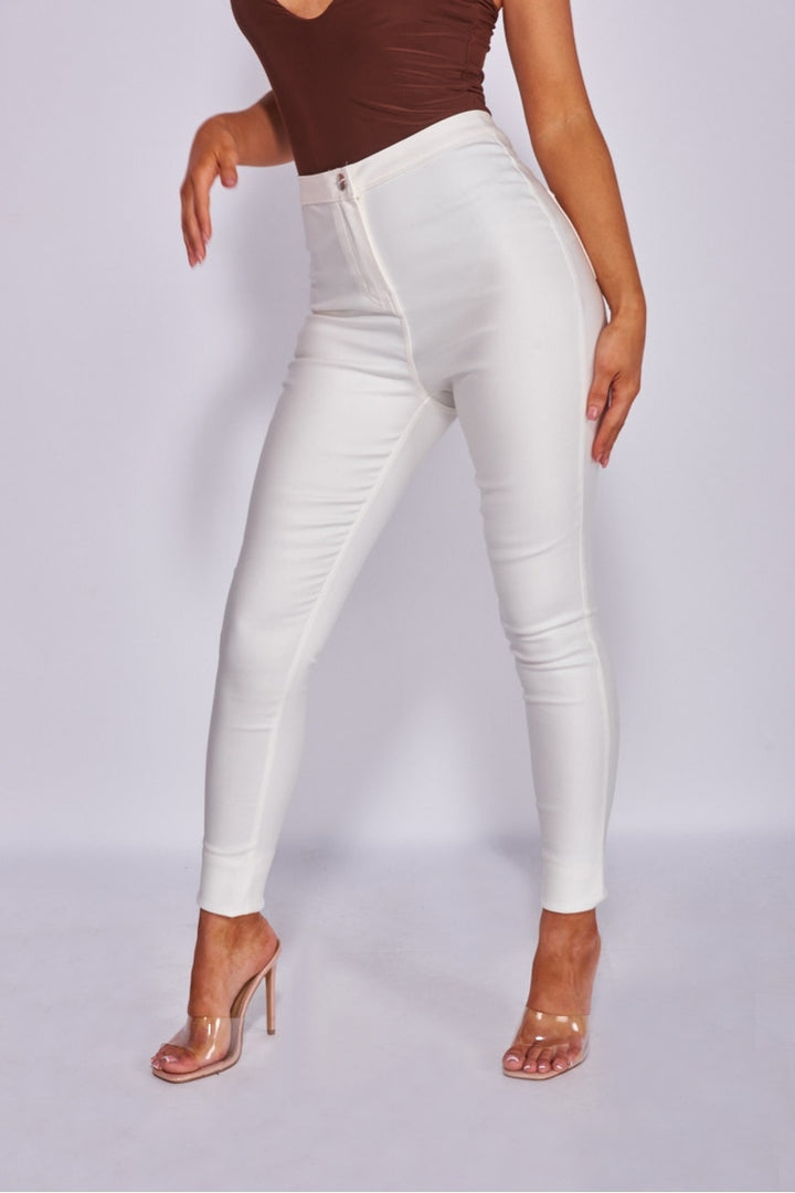 Off White Coated High Waist Jeggings